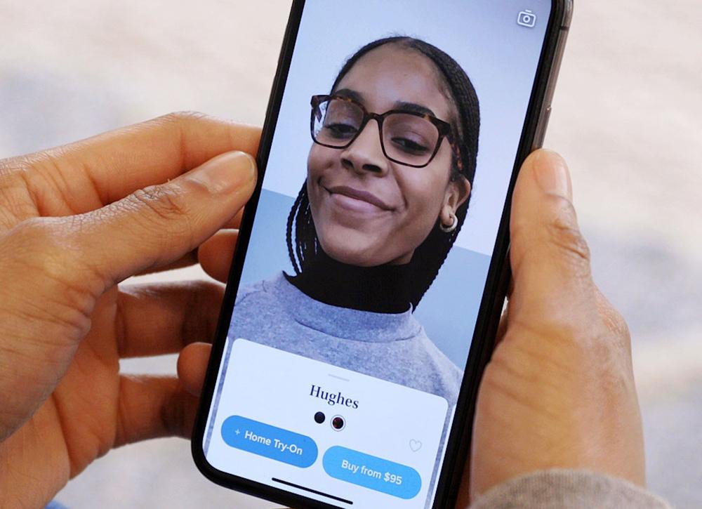 What are the features of the eyewear retailer's mobile app?