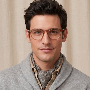 Man wearing glasses and a gray coat CARFIA Vinyl FC02 Crystal Brown Round Acetate Eyeglasses handmade eyewear