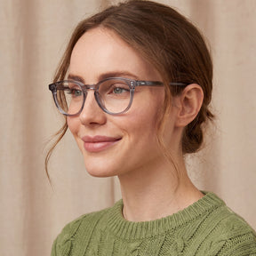 Woman wearing glasses CARFIA Vinyl FC04 Crystal Grey Round Acetate Eyeglasses women eyewear
