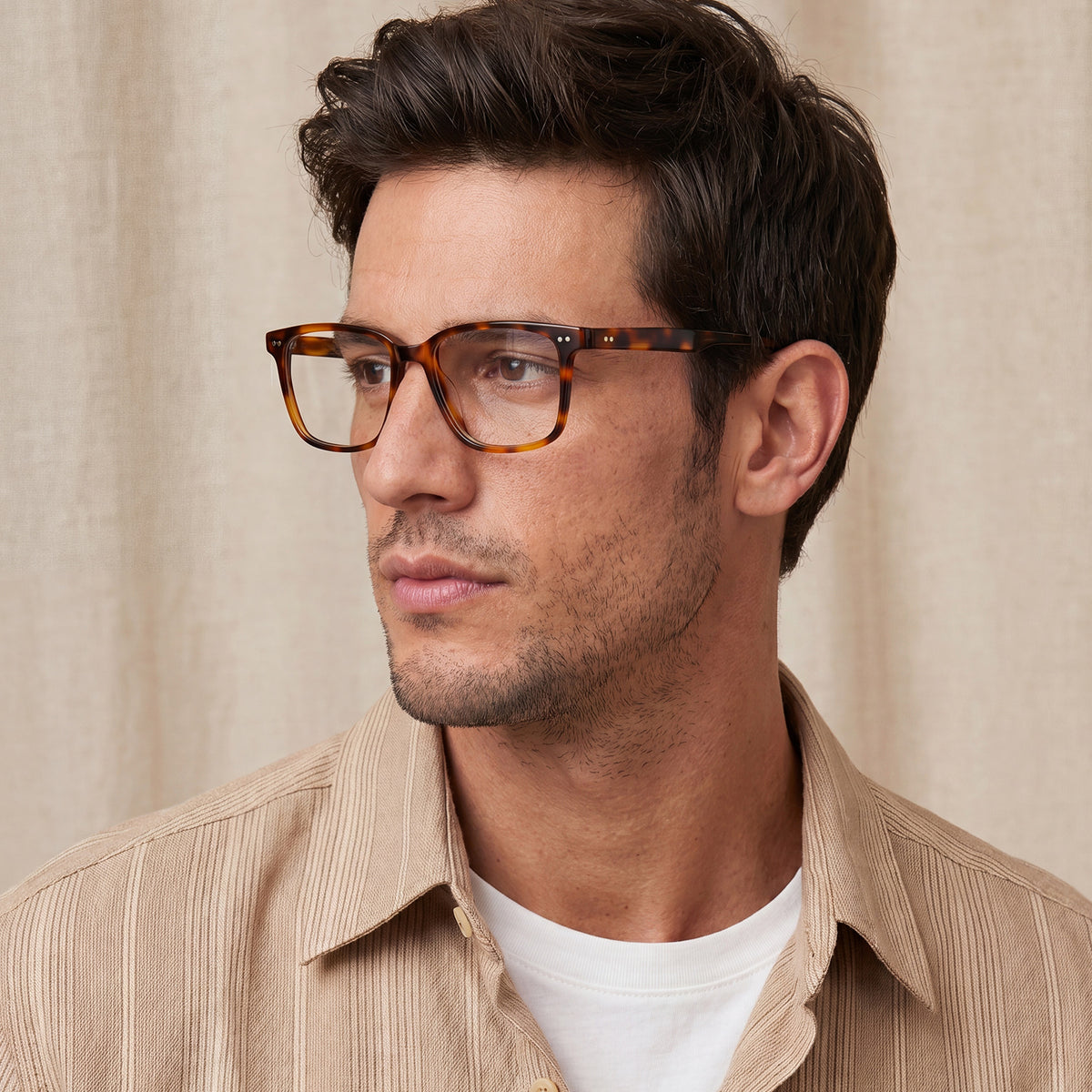 Man wearing tortoiseshell glasses Timeless Tortoiseshell CARFIA Martia Square Eyeglasses 