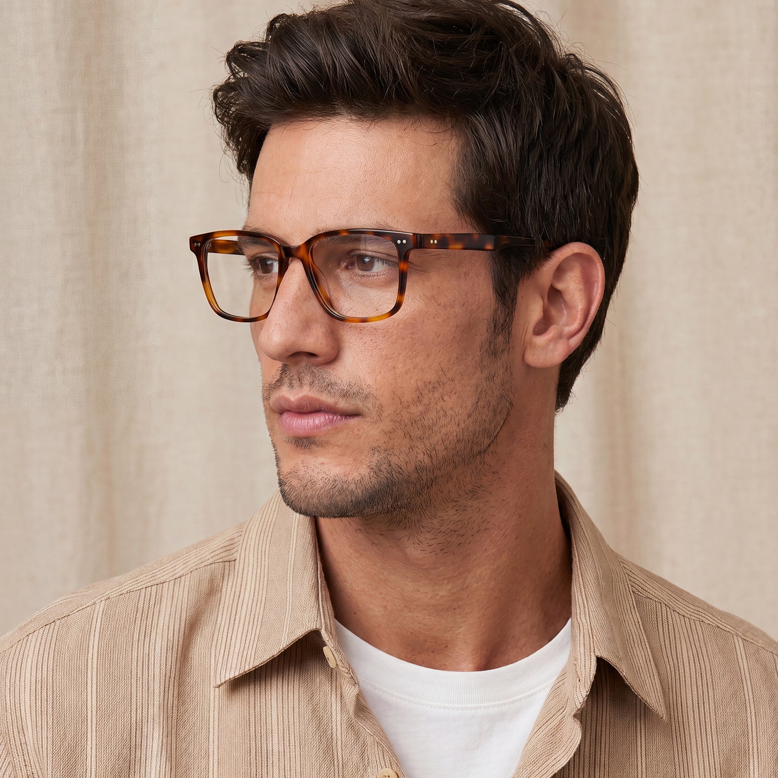 Man wearing tortoiseshell glasses Timeless Tortoiseshell CARFIA Martia Square Eyeglasses 
