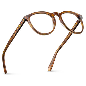Premium tortoise brown acetate eyeglasses detail showing classic tortoiseshell pattern and craftsmanship