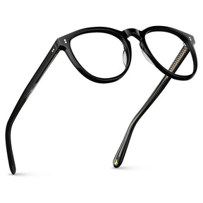 Premium black acetate eyeglasses detail closeup showing round lens shape chevron temple design and quality craftsmanship